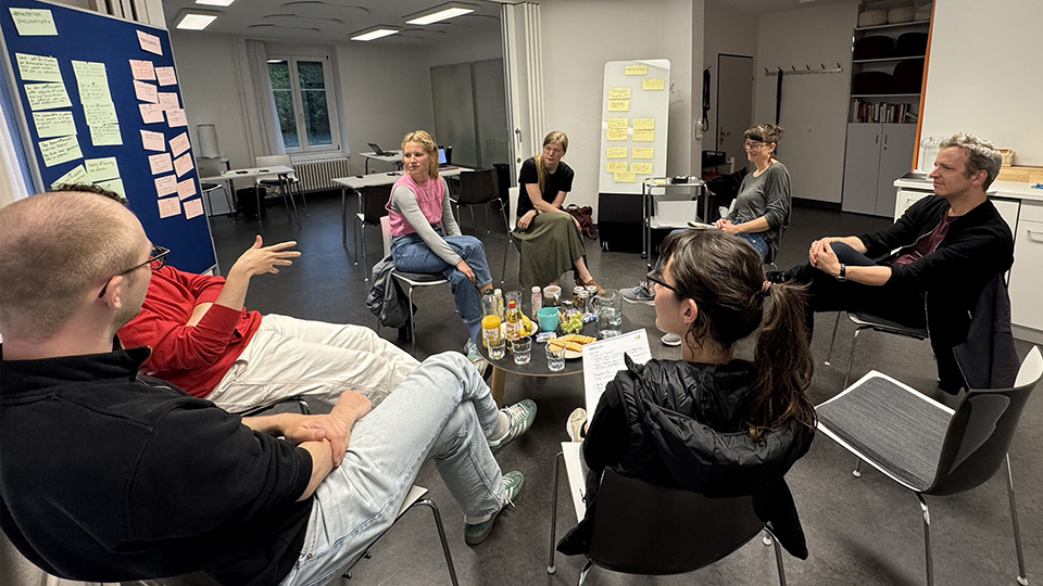 circle of people discussing during workshop